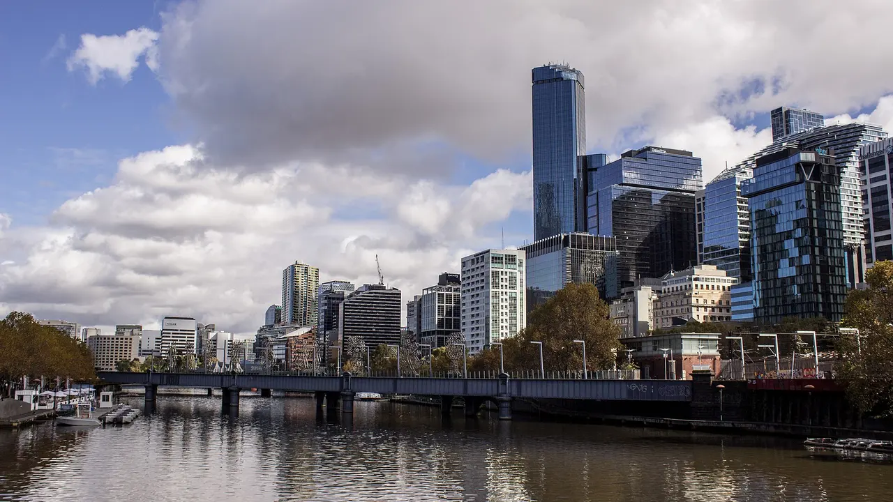 Melbourne city beside the Yarra River, viewed west from Princes Bridge.