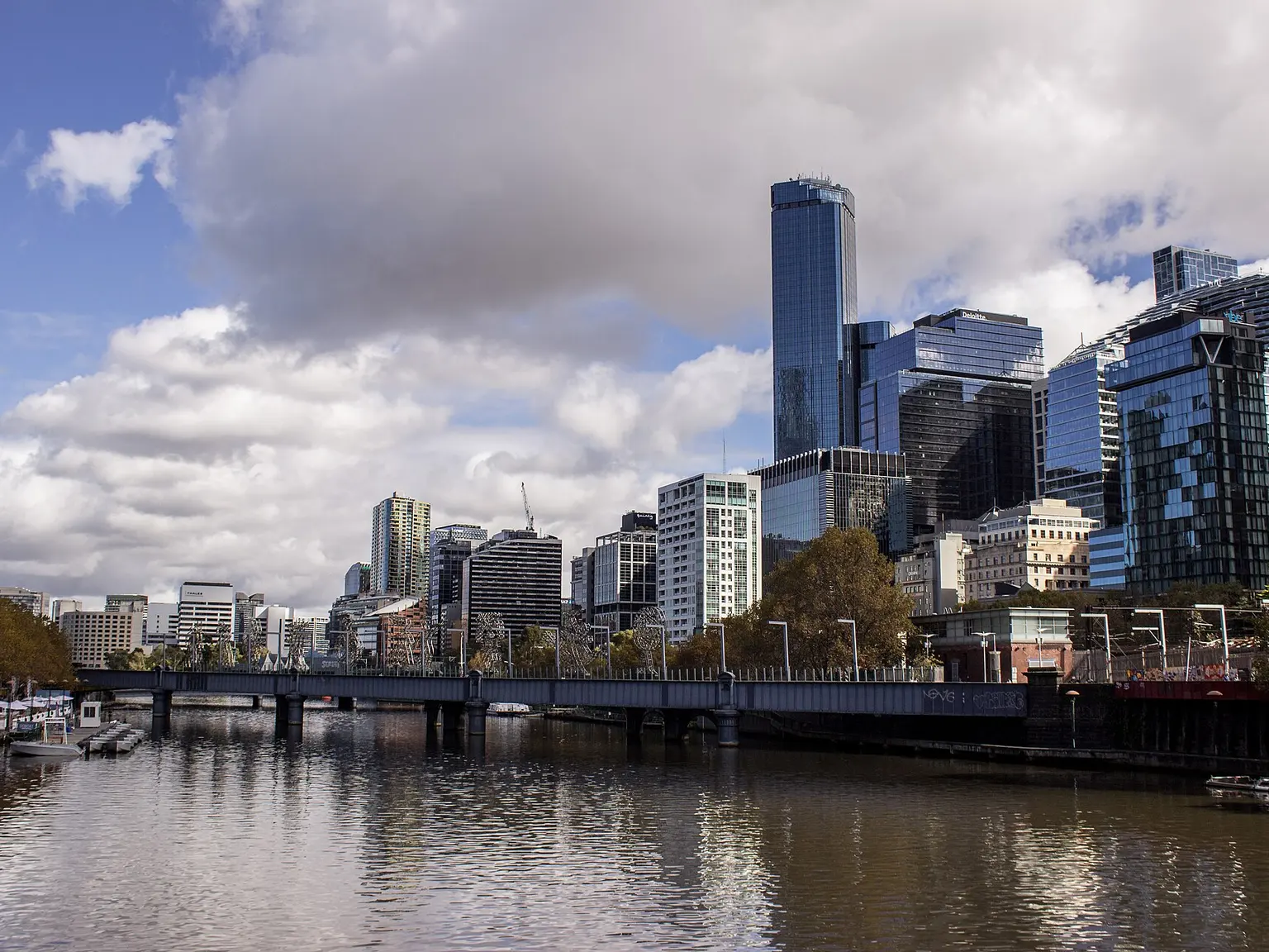 Melbourne city beside the Yarra River, viewed west from Princes Bridge.
